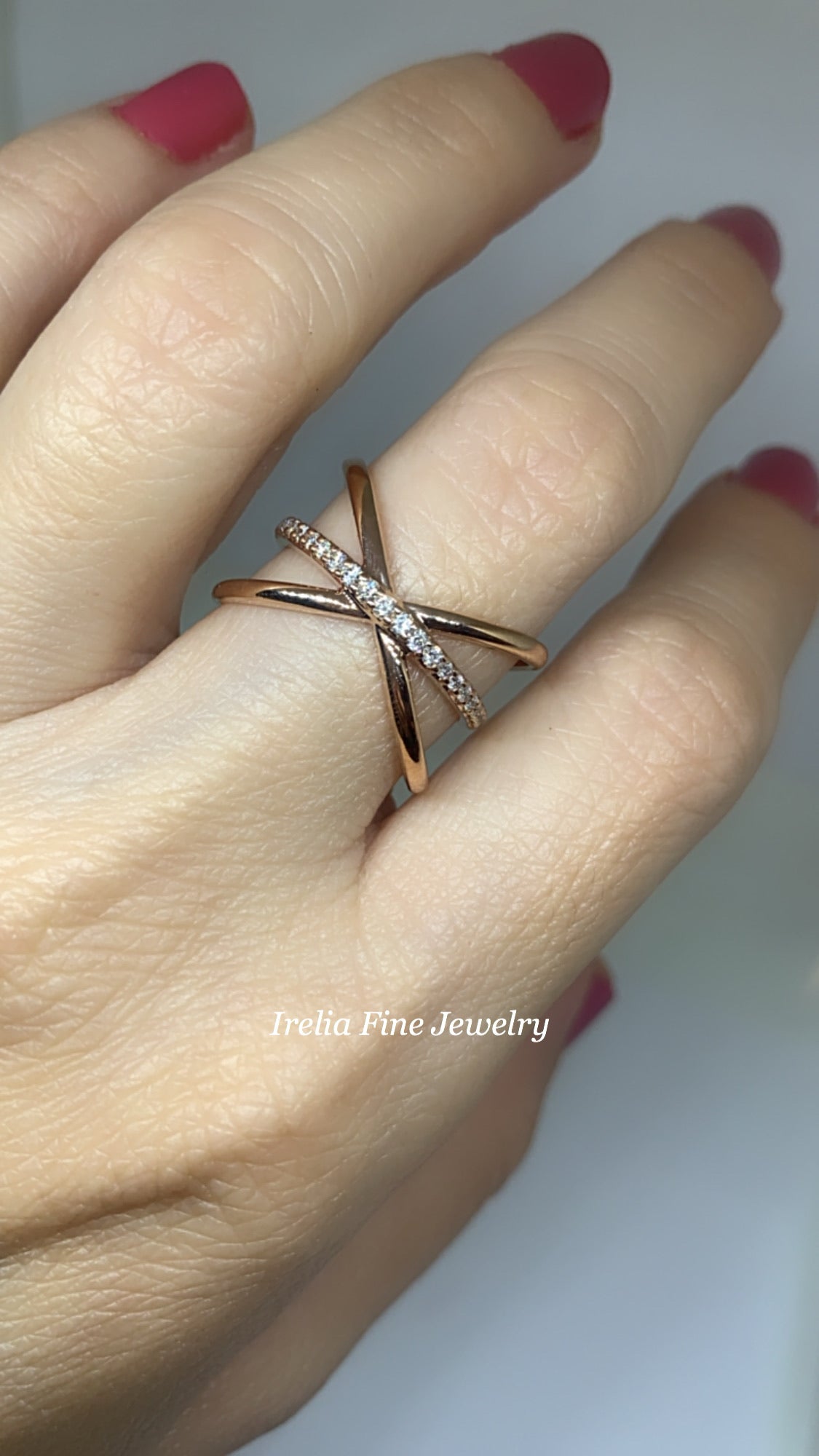 14K Rose Gold with 1/6 CTW Natural Diamond Ring with Criss-Cross Design