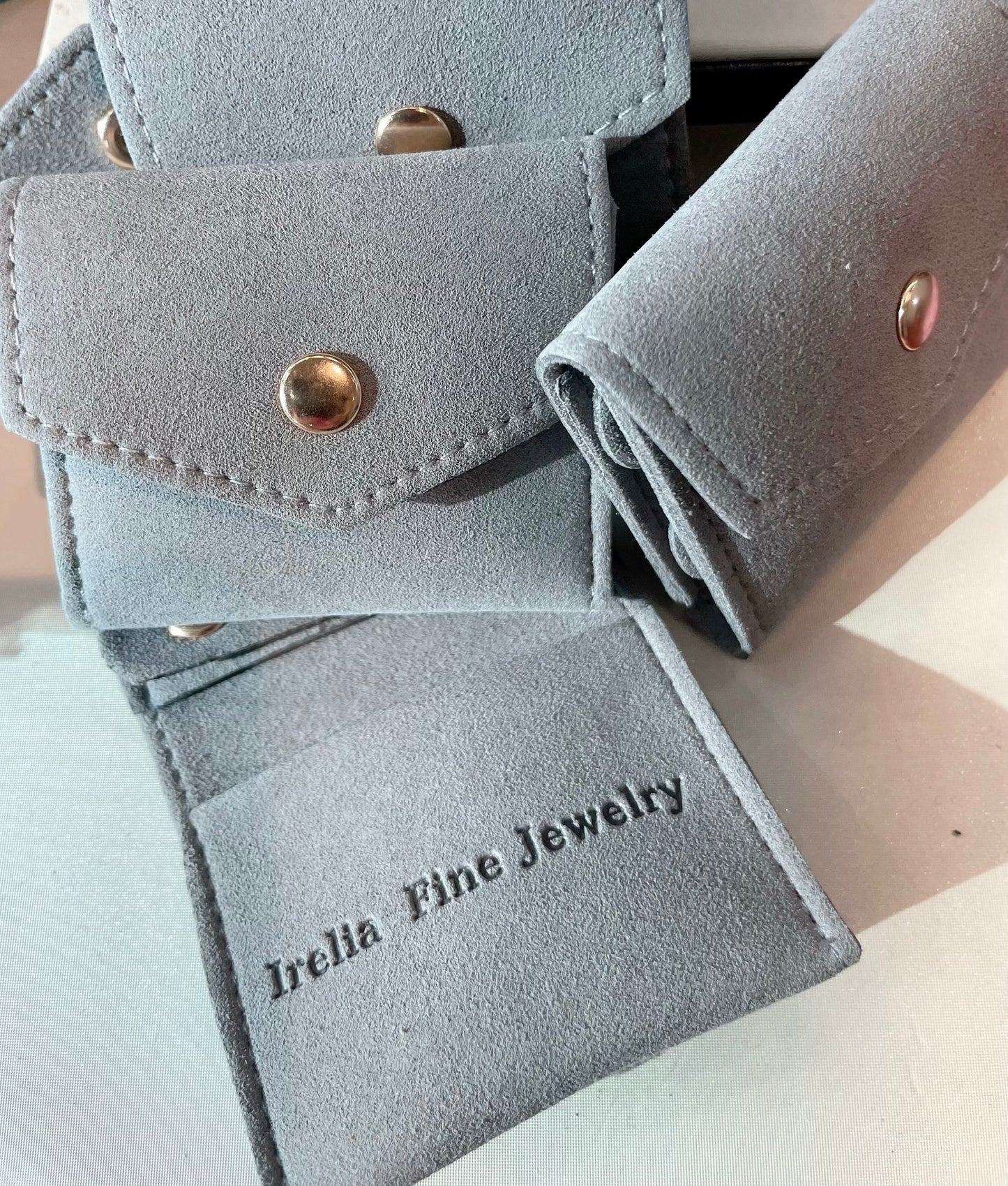 Microfiber Mini Travel Jewelry Pouch with Irelia Fine Jewelry logo