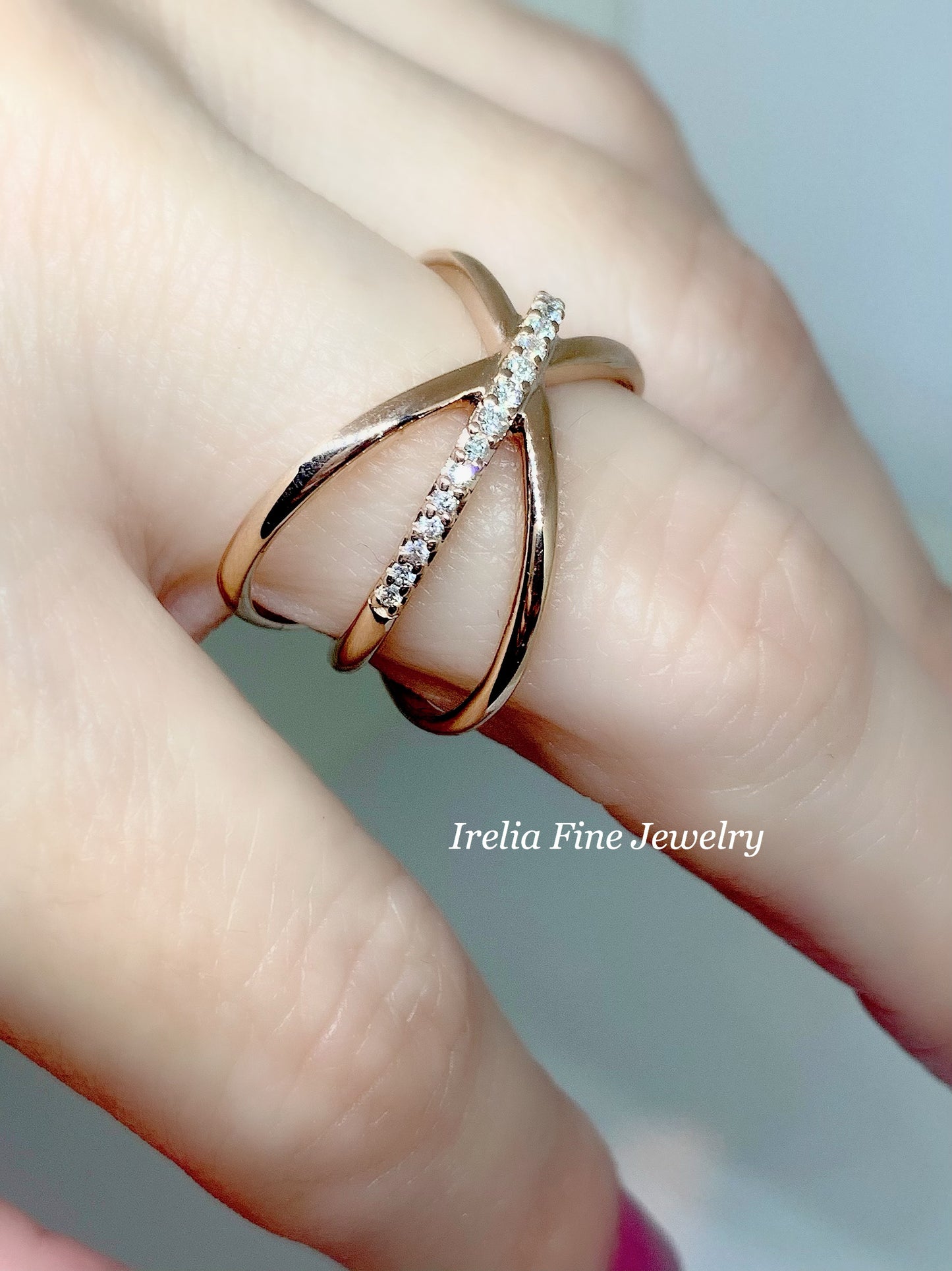 14K Rose Gold with 1/6 CTW Natural Diamond Ring with Criss-Cross Design
