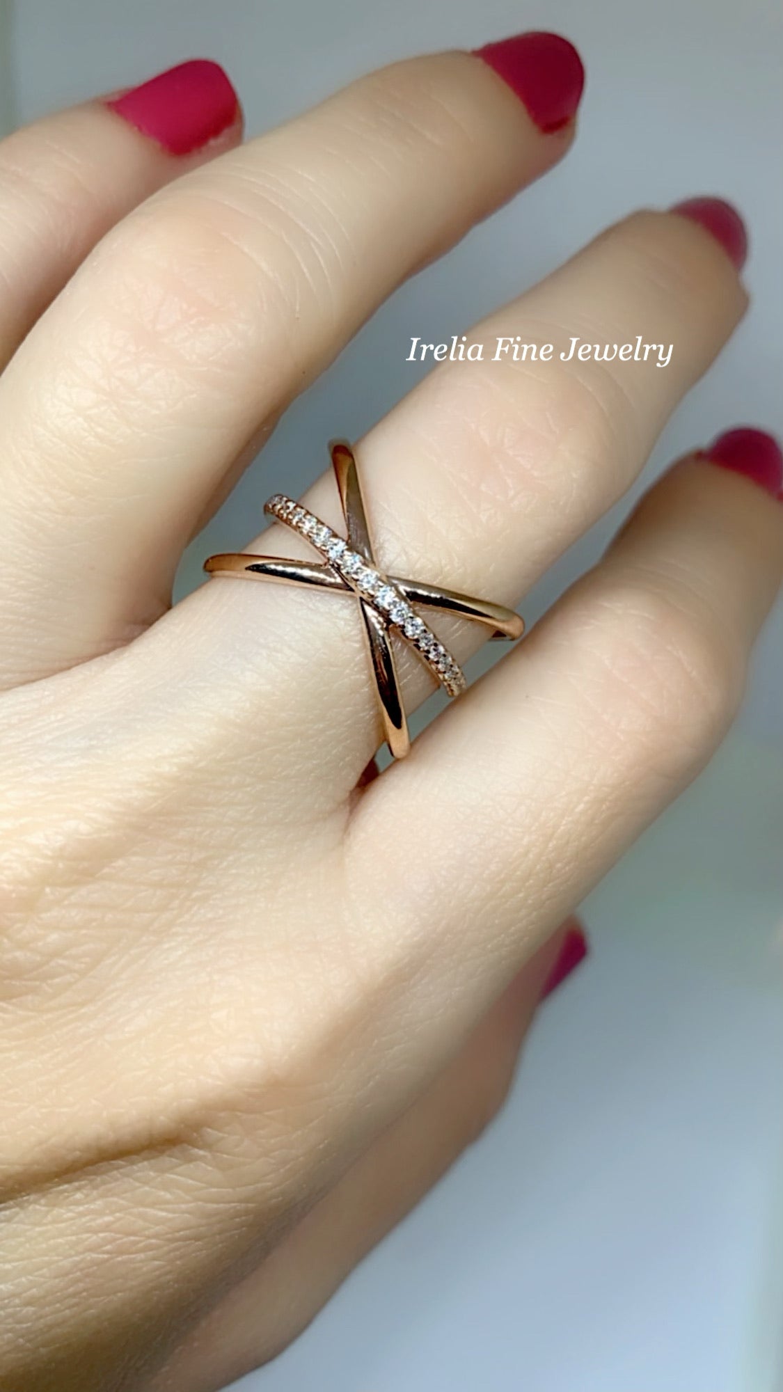 14K Rose Gold with 1/6 CTW Natural Diamond Ring with Criss-Cross Design