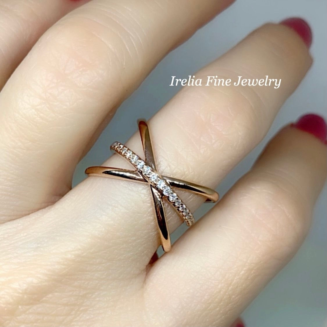 14K Rose Gold with 1/6 CTW Natural Diamond Ring with Criss-Cross Design